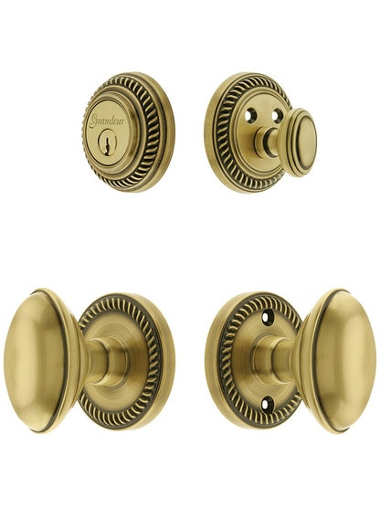 Grandeur Newport Entry Door Set, Keyed Alike with Oval Brass Knobs in Antique Brass.